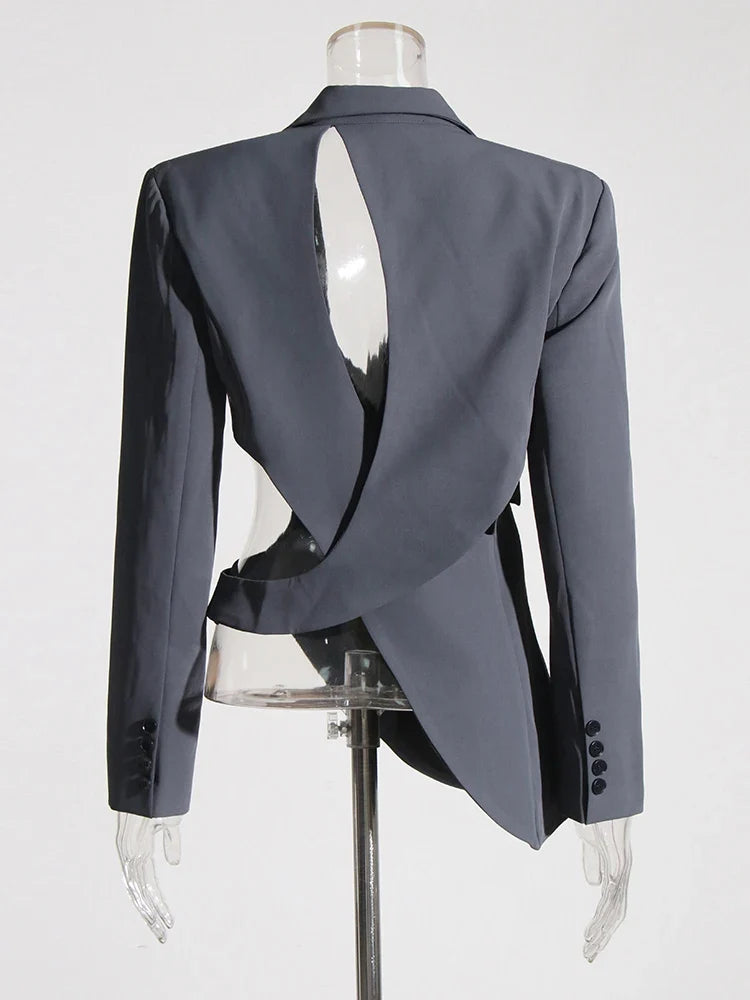 Modern women's formal blazer, an elegant asymmetric cutout jacket offering professional and chic attire.