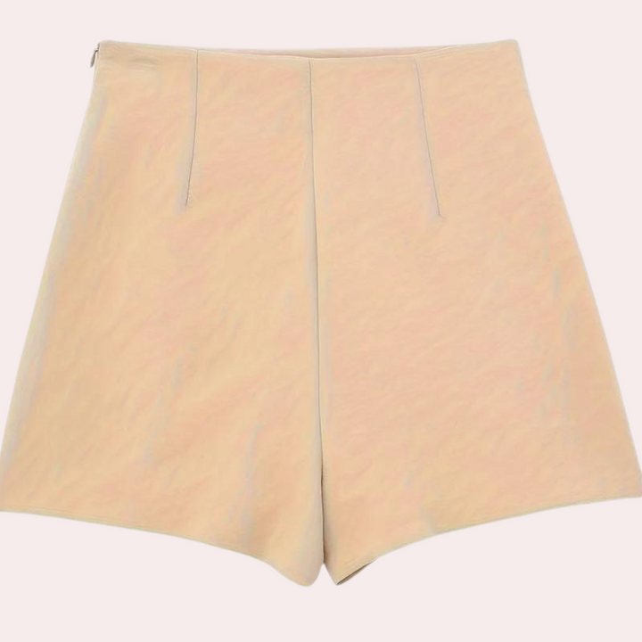 Nerina women's shorts: stylish asymmetric design, featuring elegant decorative buttons.