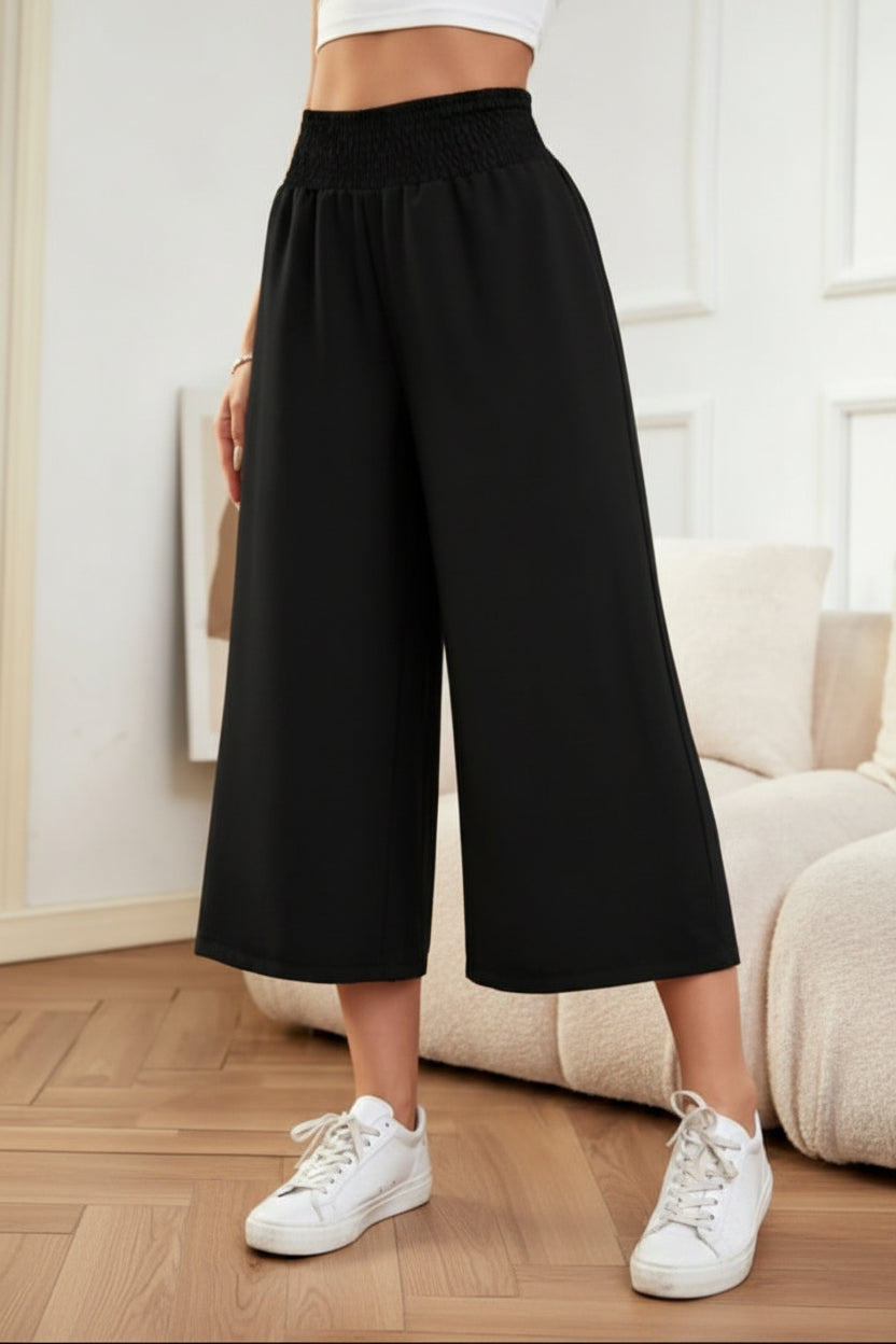 Comfortable women's wide-leg cropped pants in khaki, featuring a relaxed fit and elastic waist for summer.