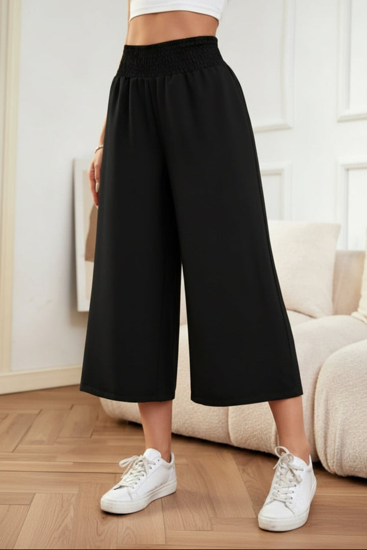 Comfortable women's wide-leg cropped pants in khaki, featuring a relaxed fit and elastic waist for summer.
