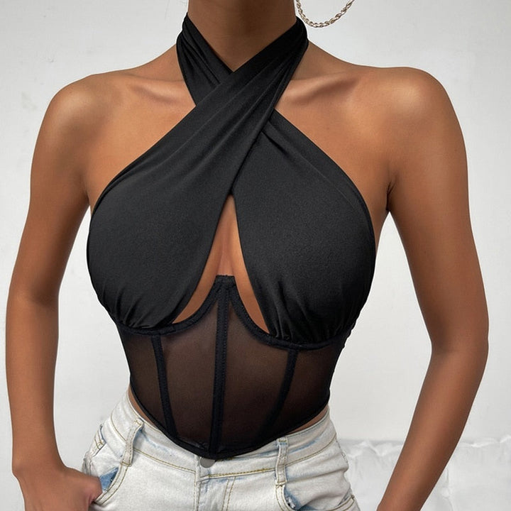 Chic women's black halter corset top. Versatile and trendy for daily wear or stylish evening outfits.