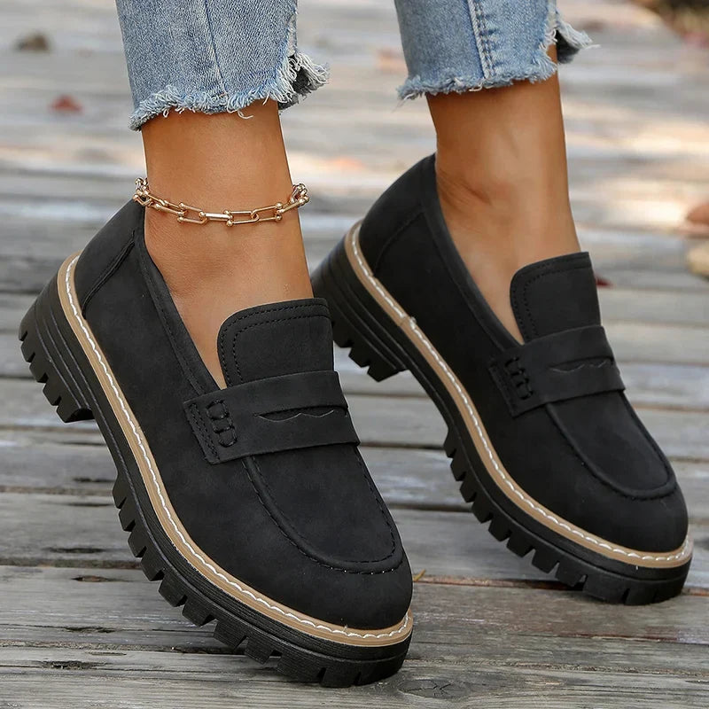 Sleek women's platform loafers, designed for modern women seeking comfort & style.