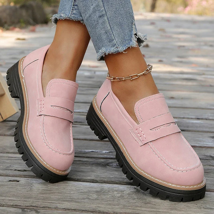 Women's comfortable slip-on platform loafers, perfect for everyday chic fashion.