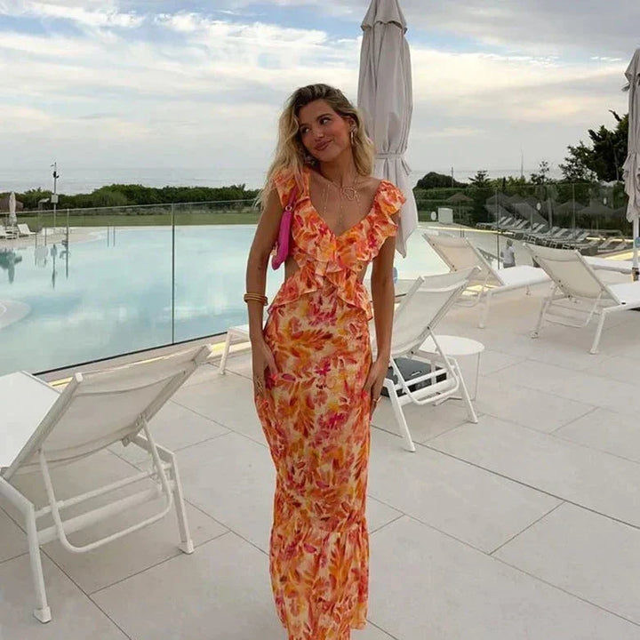 Chic women's boho print ruffle dress with V-neck & batwing sleeves, perfect for a trendy summer or casual look.
