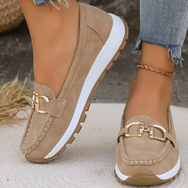 Chic women's buckle loafers for everyday comfort, perfect slip-on flats for casual or work wear.