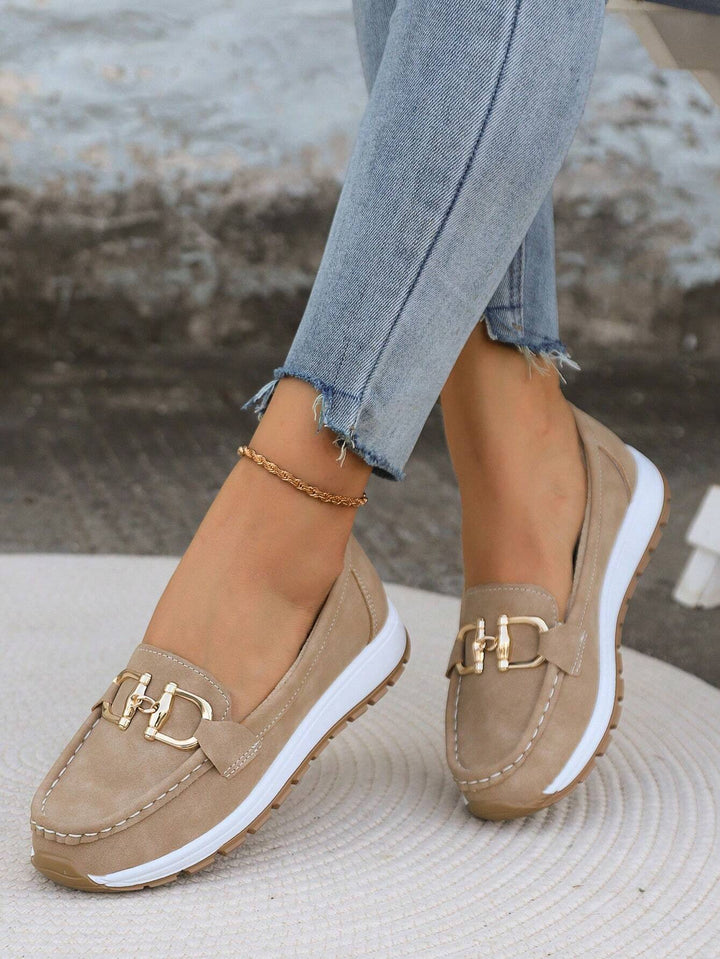 Comfortable women's buckle loafers, ideal flat slip-on shoes for walking & everyday style.