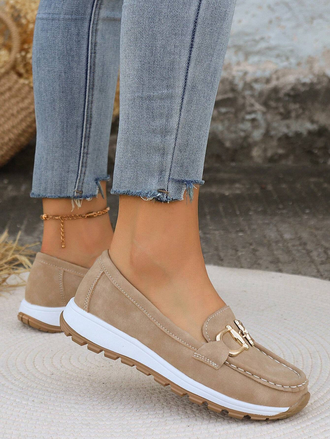 Stylish women's buckle loafers with decorative buckle, comfortable slip-on flats for chic everyday wear.