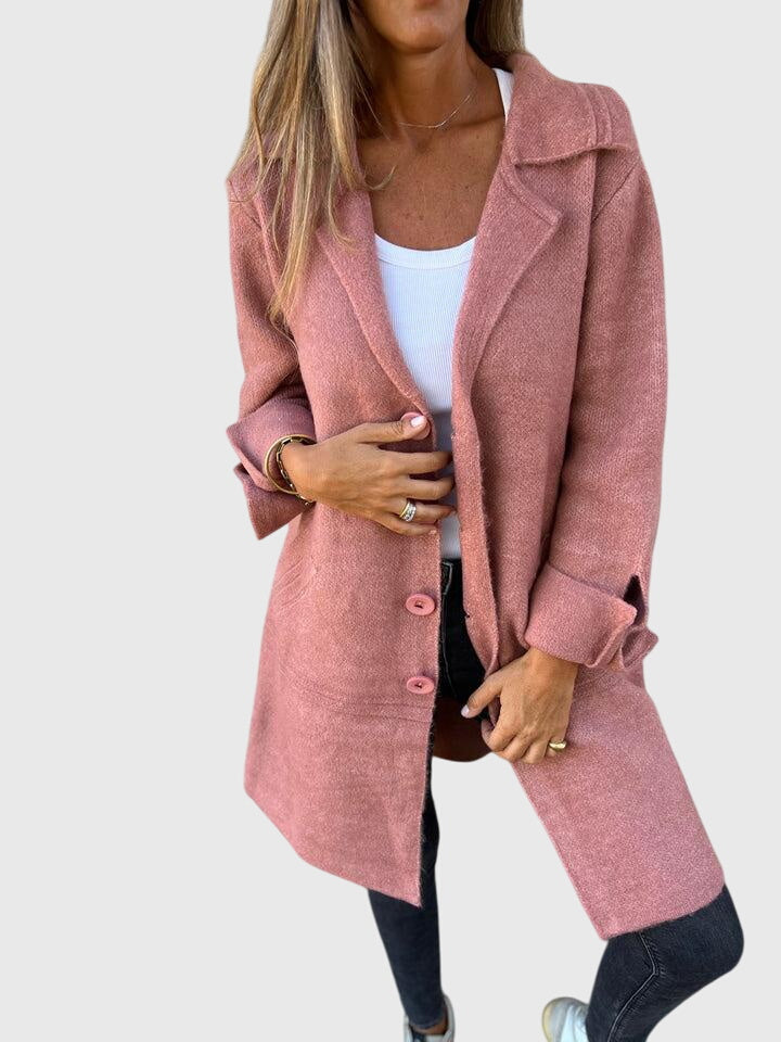Elegant button details on a sophisticated women's tailored blazer. Ideal for professional attire & business casual.