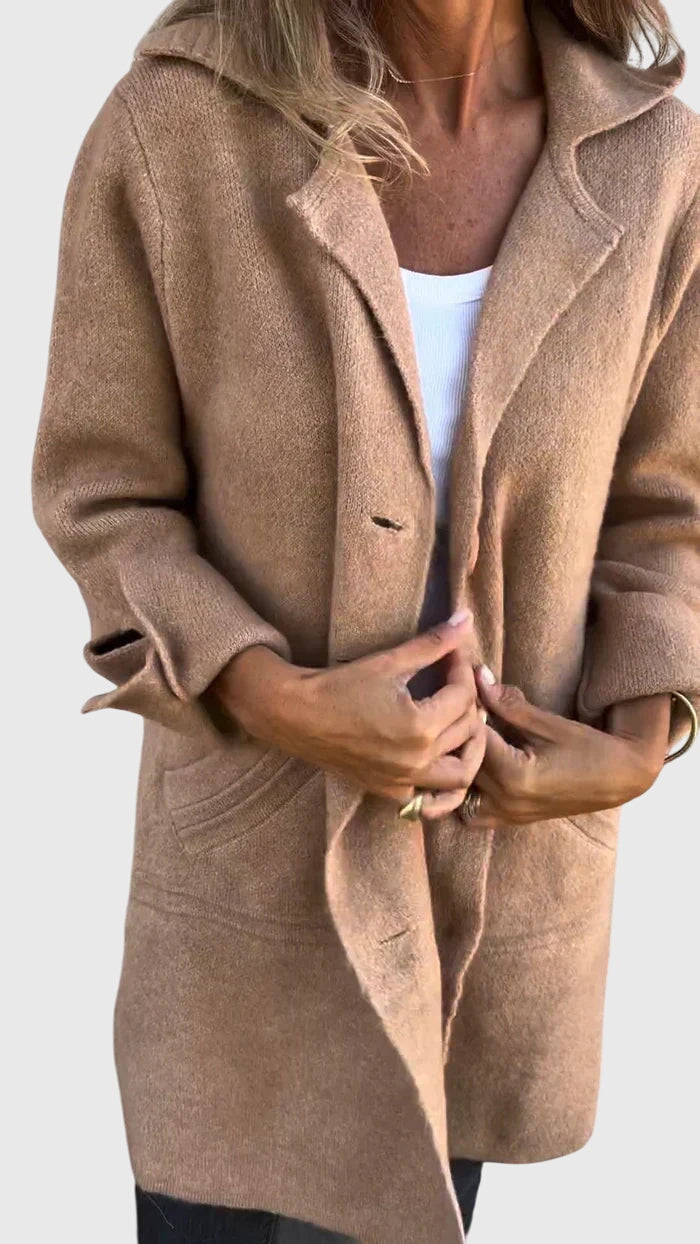 Detail of premium fabric on a women's tailored button blazer, suitable for professional attire & sophisticated style.