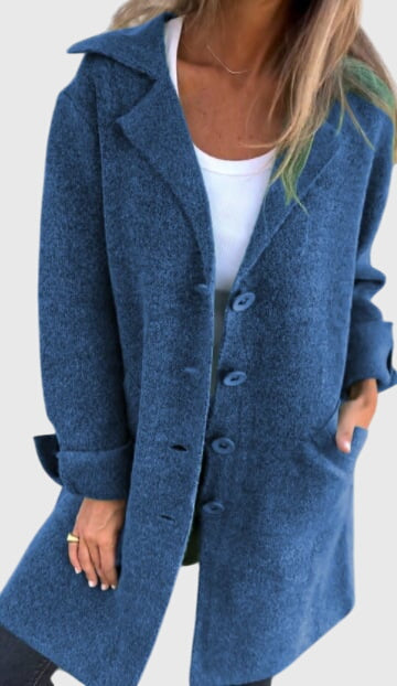 Woman confidently wearing a chic tailored button blazer, ideal for professional office wear and modern fashion.