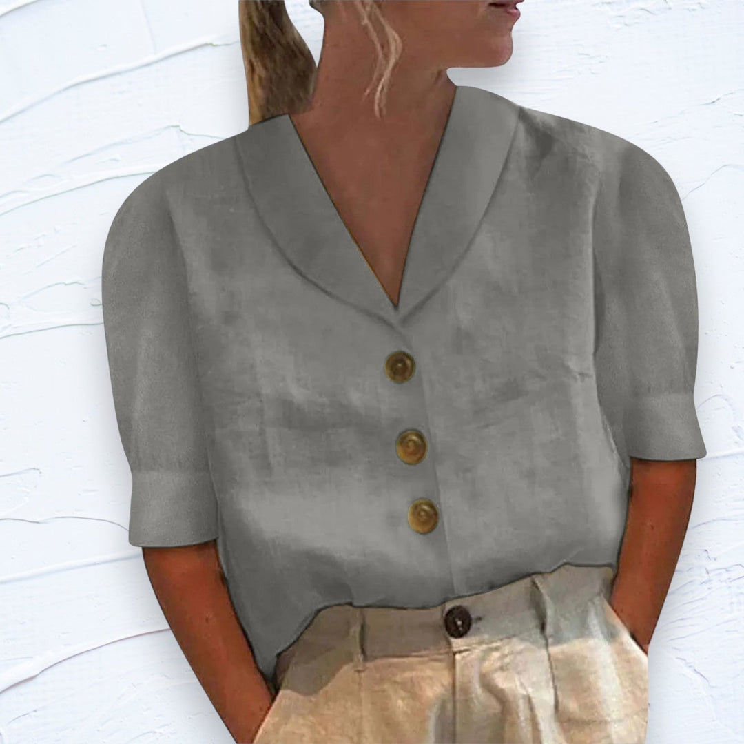 Modern chic women's button-down blouse with a collar. Versatile solid top for spring & summer fashion trends.