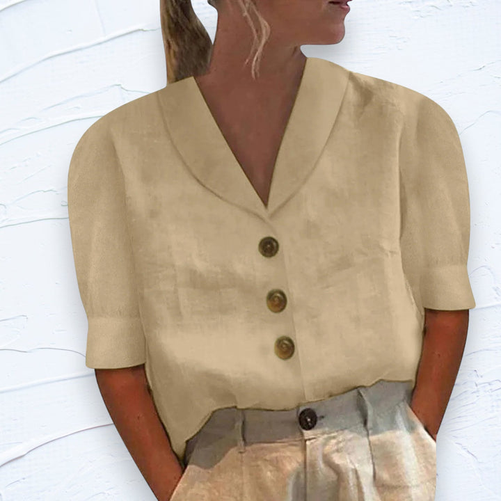 Solid color elegant women's button-down blouse with collar. A versatile spring/summer top for sophisticated outfits.