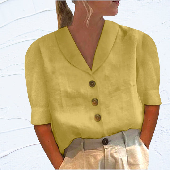Fashionable women's button-down blouse with collar. Versatile & chic for spring, summer, office, or everyday style.