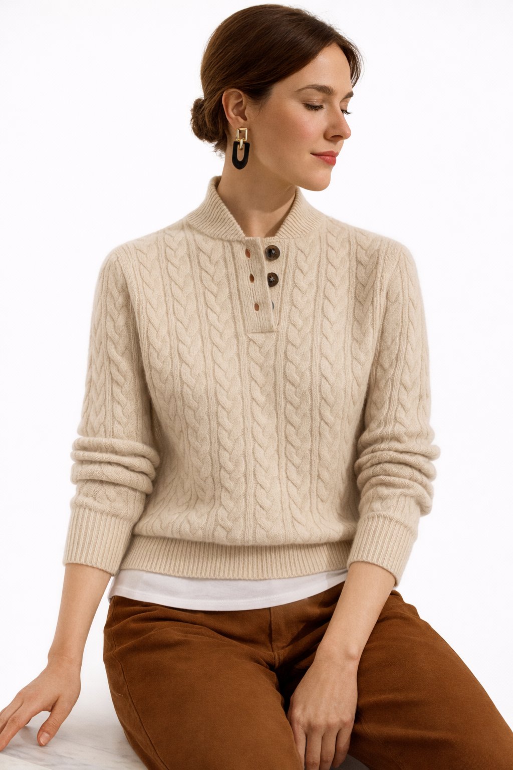 Women's chic button-neck cable knit pullover. A warm & versatile sweater for fall and winter style.
