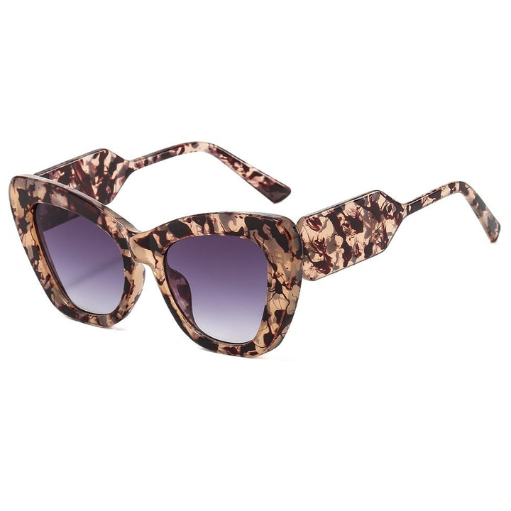 Elegant women's cat eye sunglasses with gradient lenses, UV400 protection, and polarized for chic style.