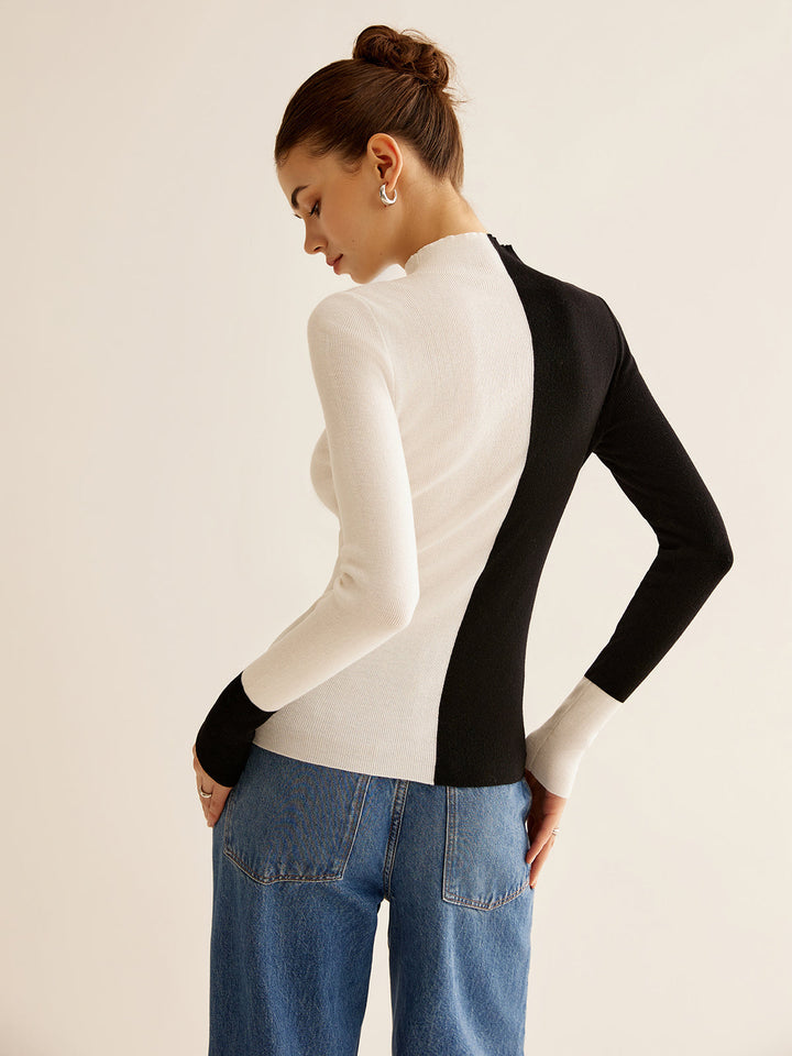 Trendy women's pullover sweater with elegant color block, great for casual or dressed-up looks.