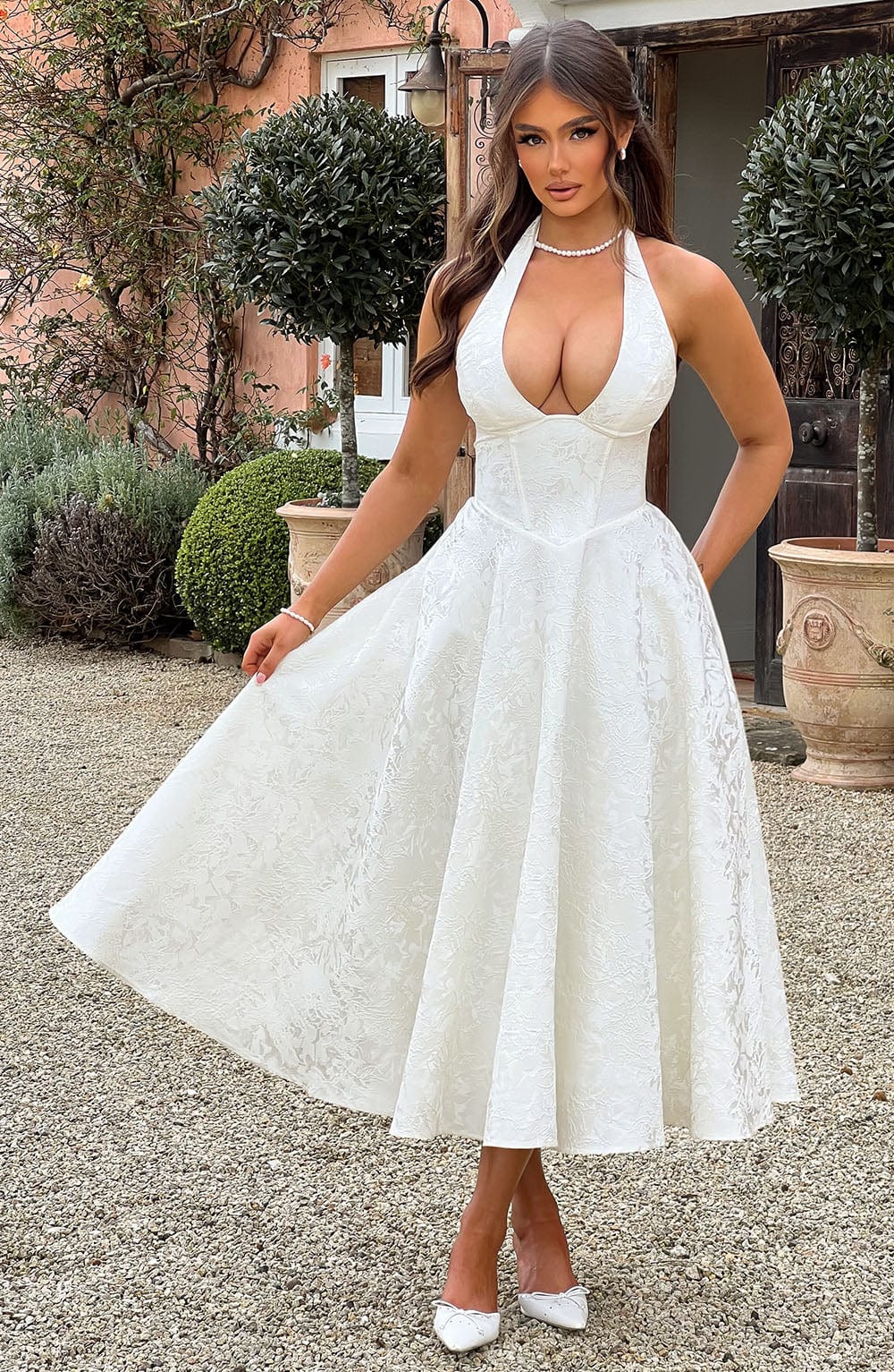 Elegant women's midi halter dress with corset bodice & A-line skirt, perfect for summer weddings & formal occasions.