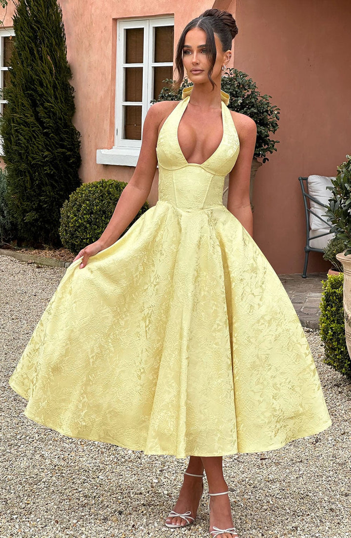 Look stunning in this elegant A-line corset halter midi wedding guest dress, ideal for summer occasion wear.