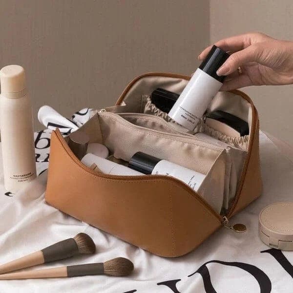 Elegant women's portable makeup bag, a stylish beauty organizer with secure zippered compartments.