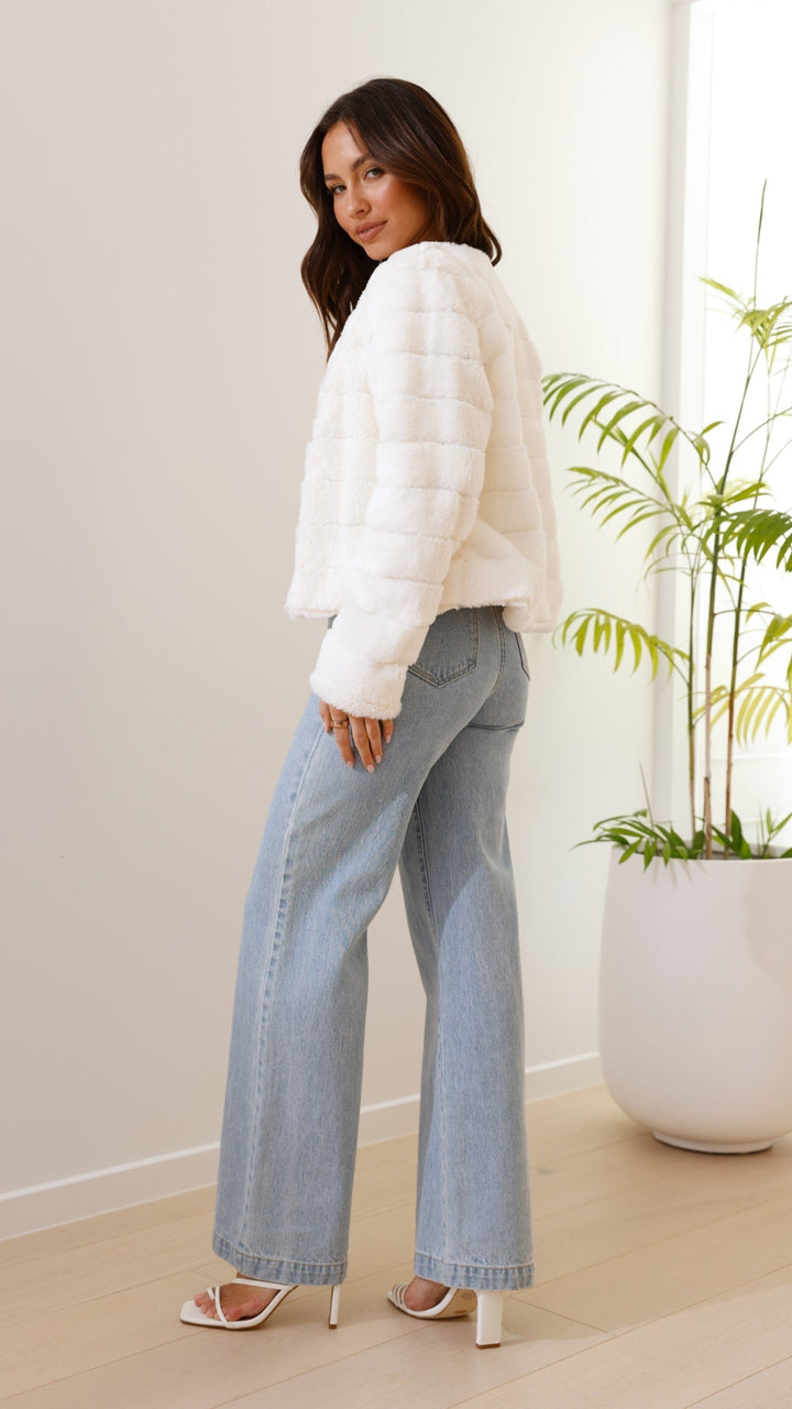 Premium women's cropped jacket, a must-have statement piece this season.