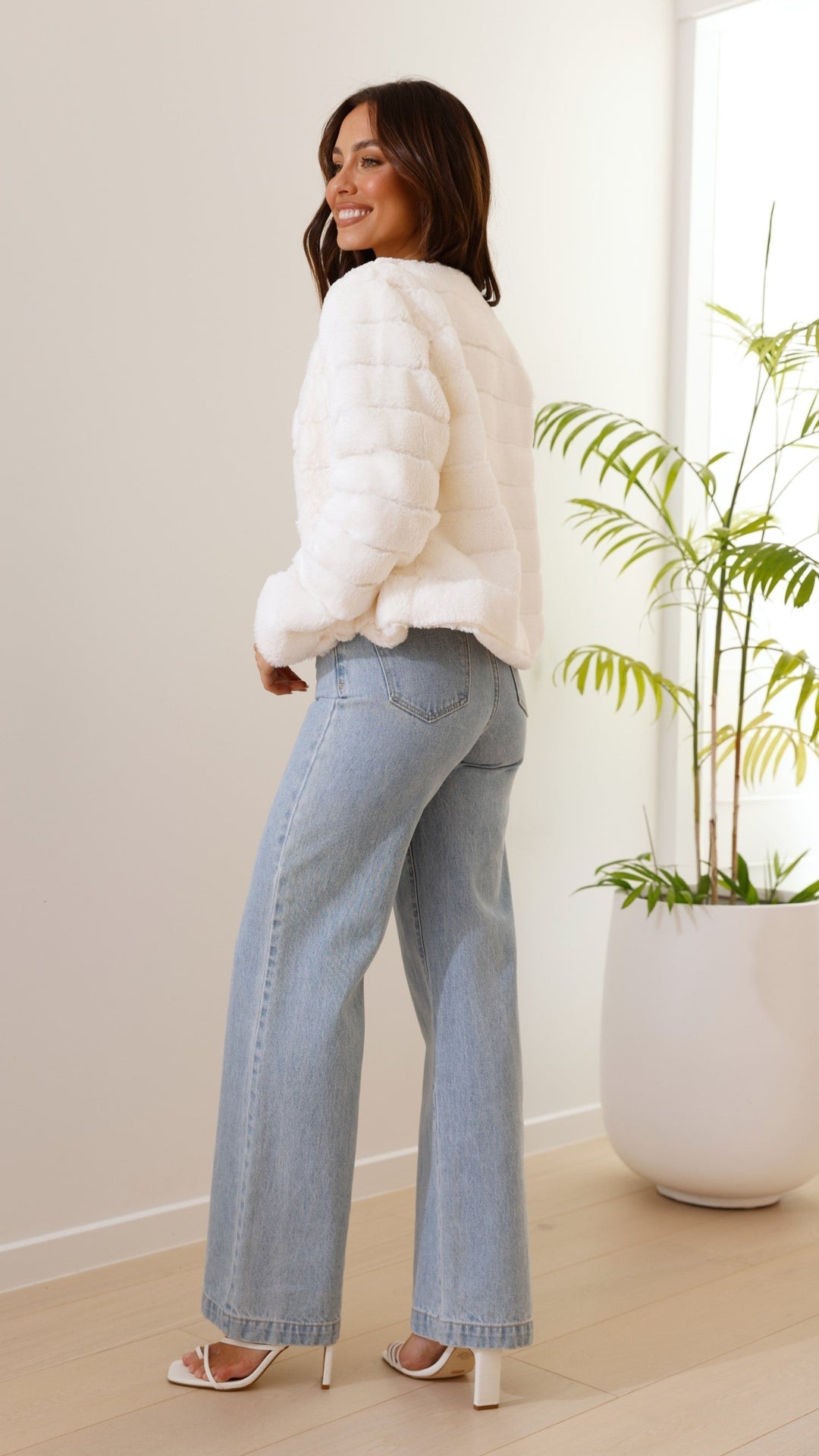 Fashionable striped cropped jacket for women. Cozy & chic fall outerwear.