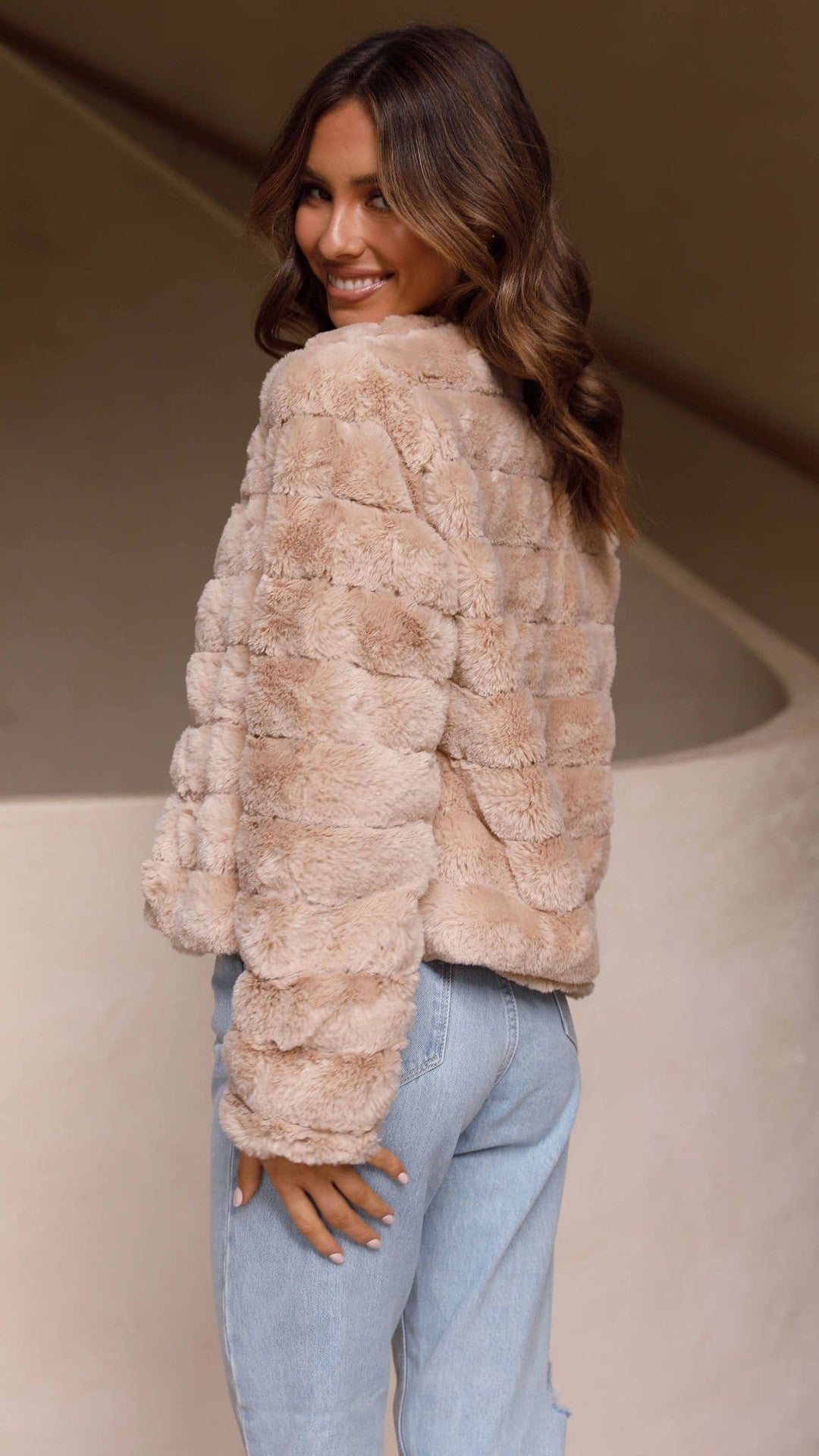 Women's chic cropped jacket, a fashionable statement for fall and winter.