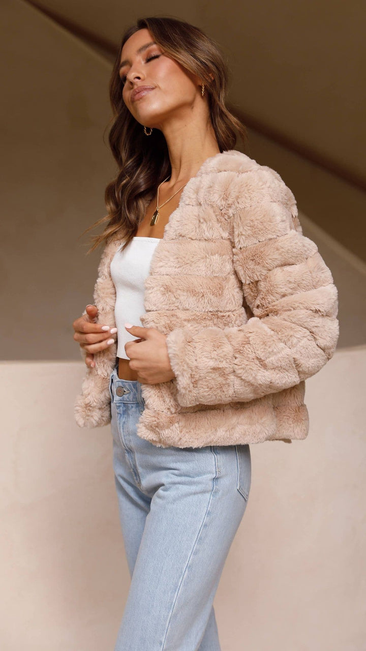 Elegant cropped jacket, a stylish women's top for sophisticated outerwear.