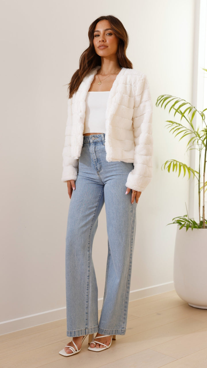 Elegant ladies' cropped jacket, a statement piece for any wardrobe.