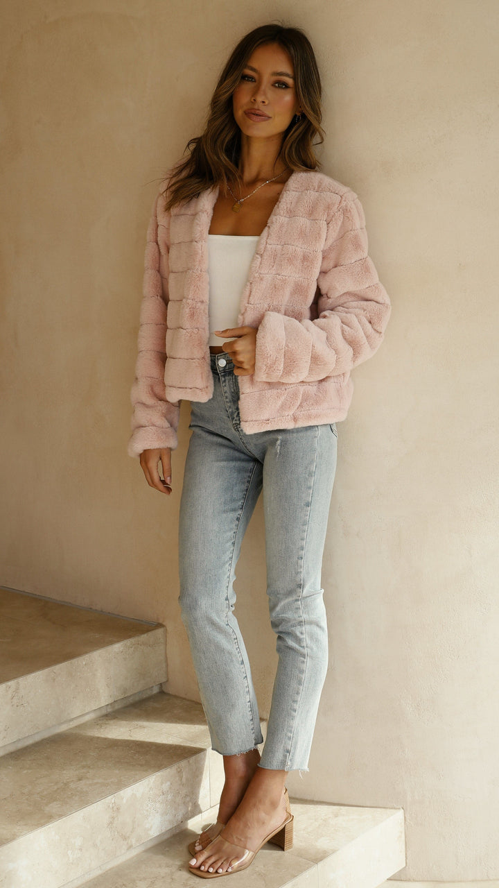 Chic women's cropped jacket, perfect for an elevated casual elegant style.