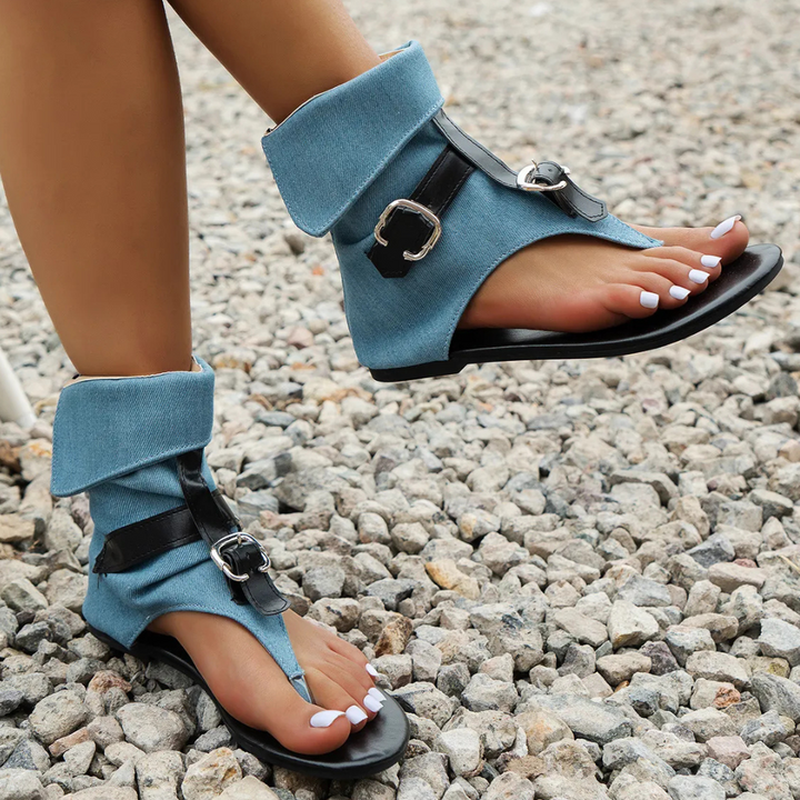 Chic women's denim flat sandals. Comfortable casual summer footwear with a trendy design for everyday wear.