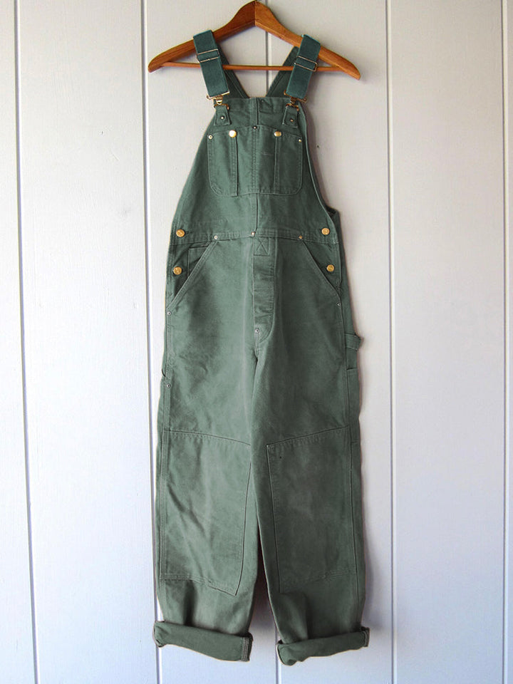 Stylish high-waisted women's jumpsuit. Chic, versatile overall one-piece for modern fashion in brown, green, black.