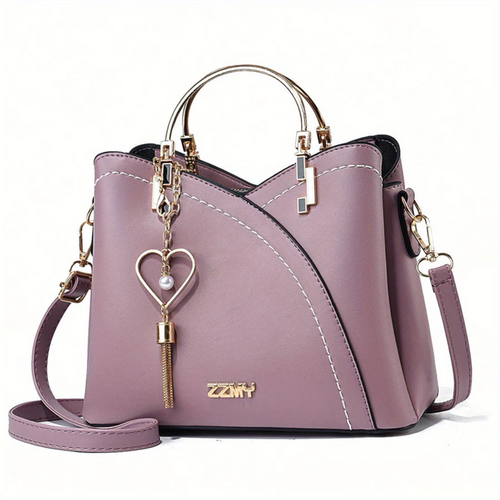 Luxurious faux leather women's shoulder bag. Chic elegant everyday handbag purse.