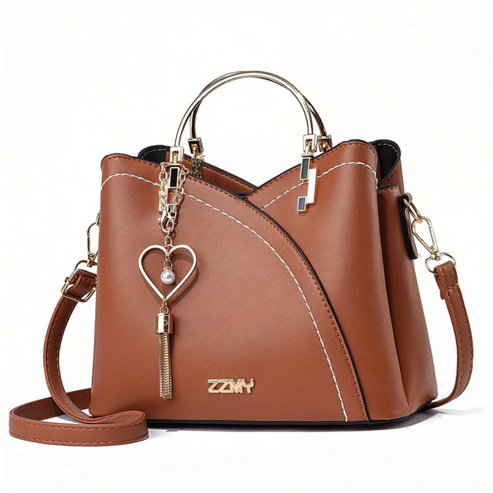 Graceful women's everyday handbag. Versatile chic faux leather shoulder bag.
