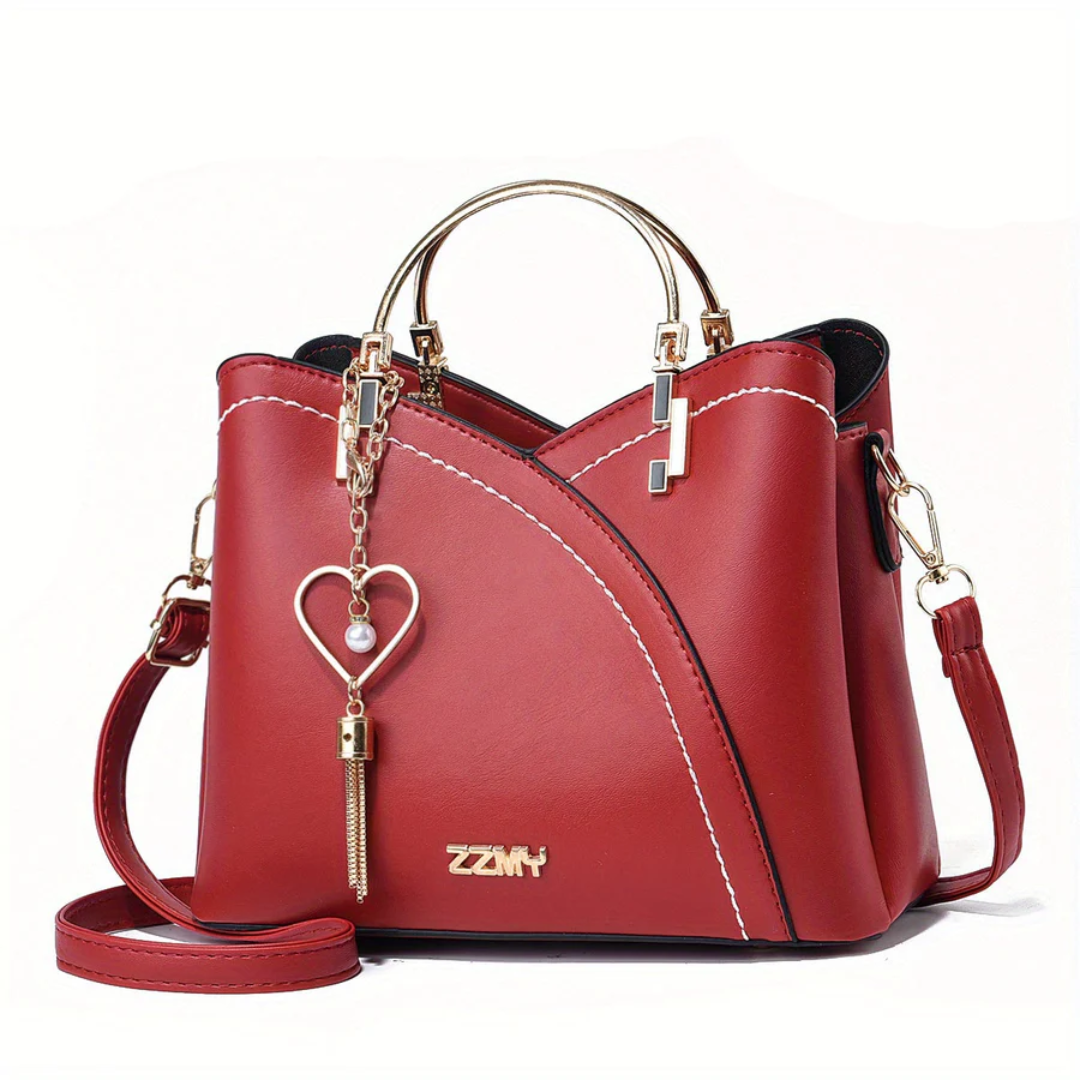 Women's elegant faux leather everyday handbag. Chic versatile shoulder bag.