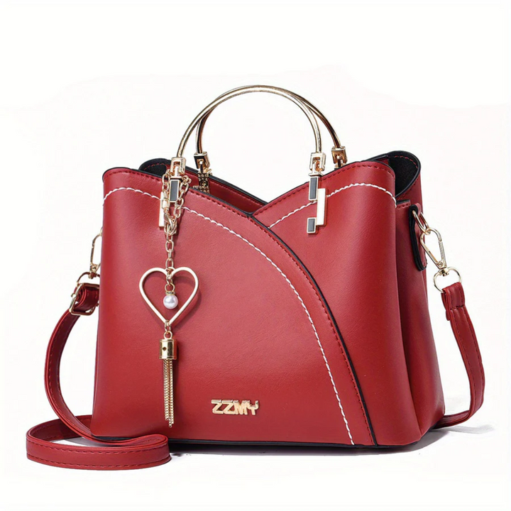 Women's elegant faux leather everyday handbag. Chic versatile shoulder bag.