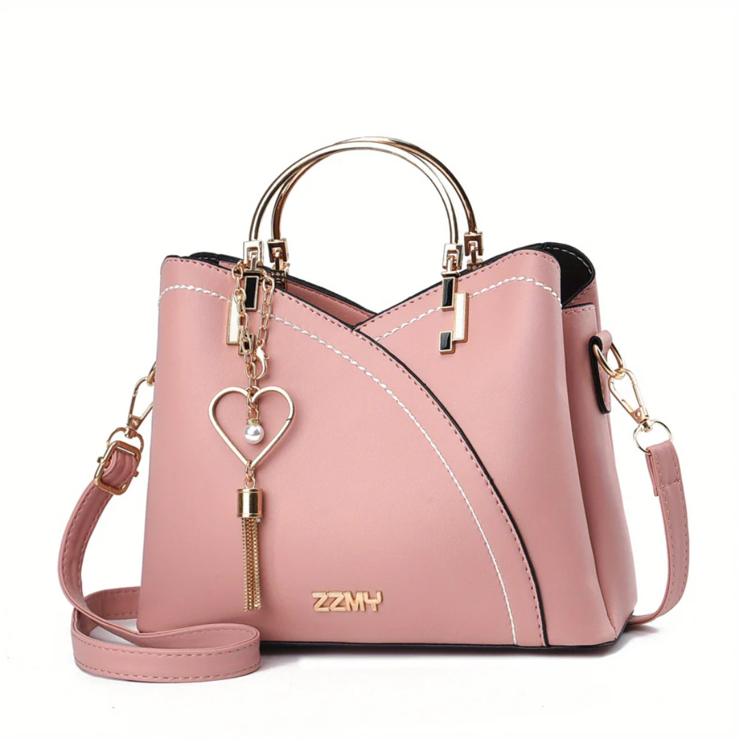 Everyday women's shoulder bag. Versatile chic faux leather purse accessory.