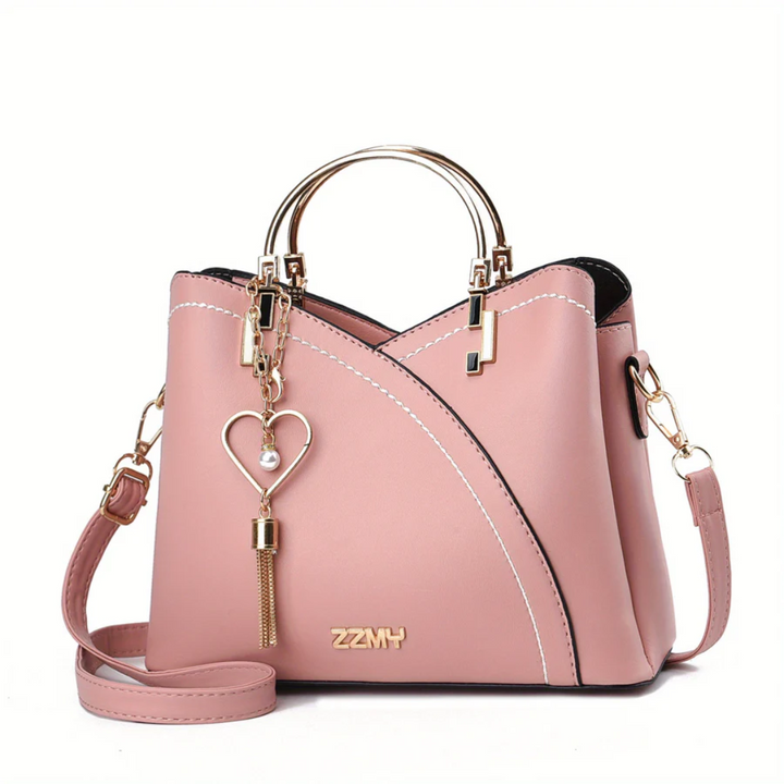 Everyday women's shoulder bag. Versatile chic faux leather purse accessory.