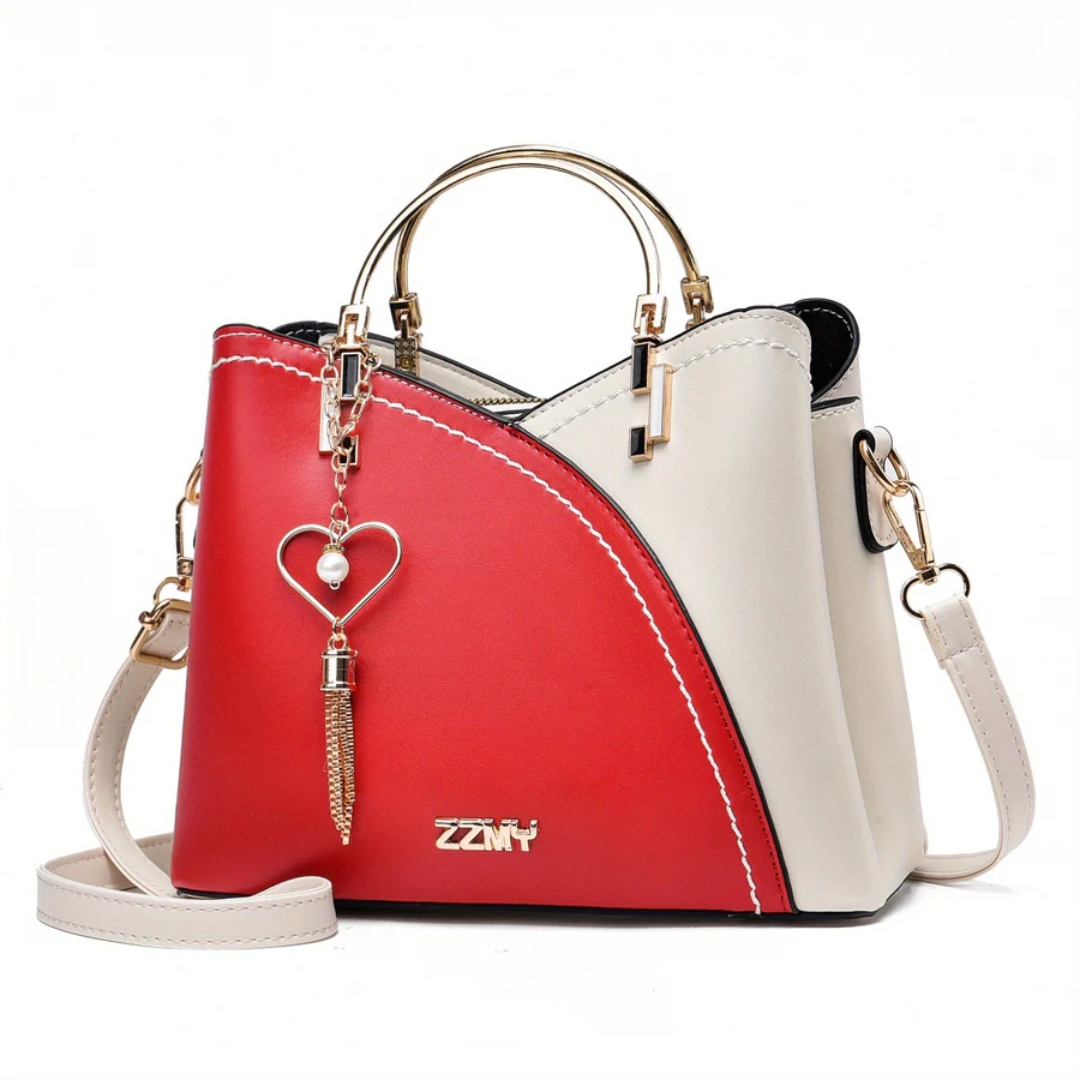 Sleek design women's faux leather shoulder bag. Elegant versatile everyday handbag.