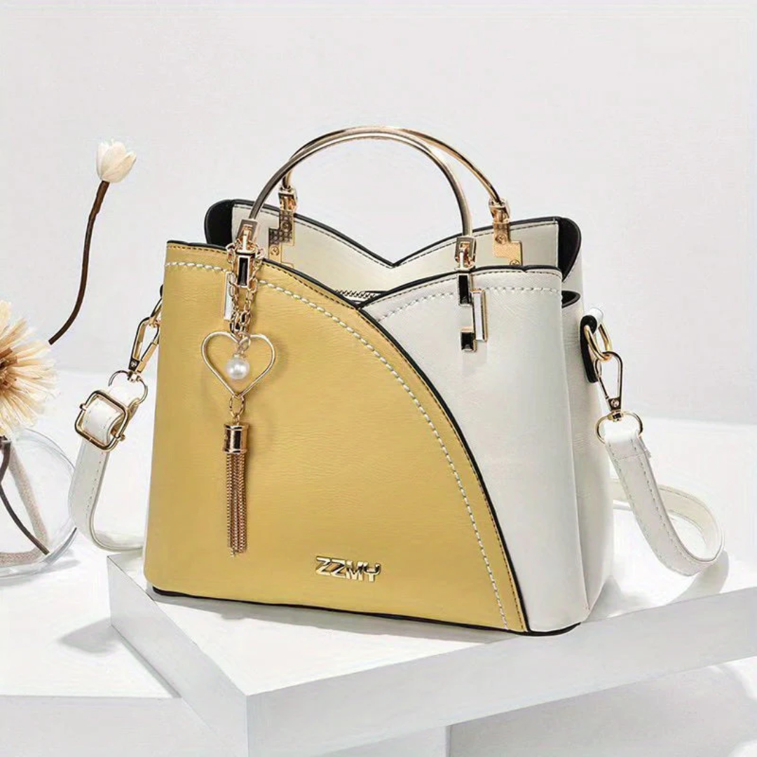 Comfortable carry women's everyday handbag. Chic faux leather versatile shoulder bag.