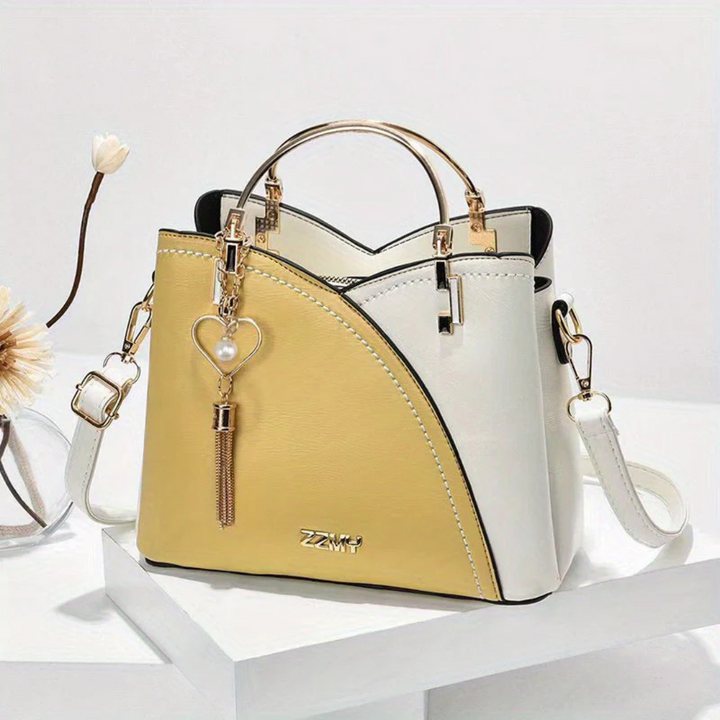 Comfortable carry women's everyday handbag. Chic faux leather versatile shoulder bag.