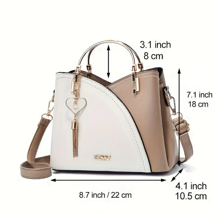 Elegant women's versatile shoulder bag. Perfect everyday faux leather purse.