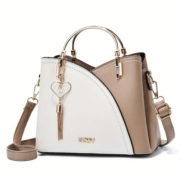 Durable faux leather women's shoulder bag. Stylish versatile everyday handbag.