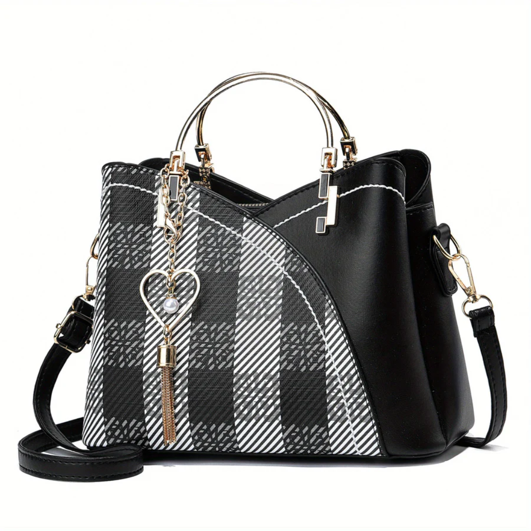Stylish brown faux leather women's handbag. Elegant versatile everyday shoulder bag.