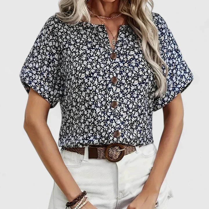 Versatile women's button-up floral blouse, a comfortable long-sleeve top ideal for spring and summer fashion.