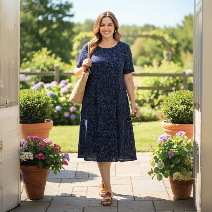 Chic women's floral short summer midi dress, perfect for casual wear or parties. Elegant flowy fit.