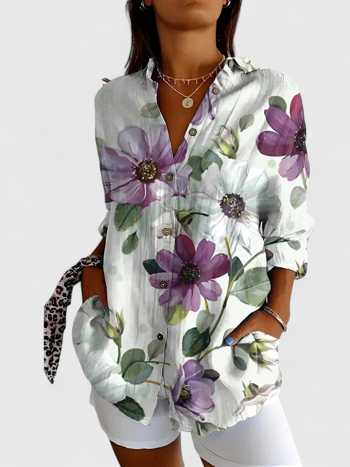 Comfortable short sleeve floral v-neck blouse for women, great for spring and summer casual or smart-casual styles.