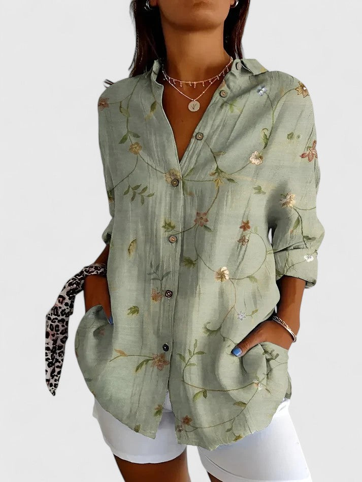 Versatile women's chic floral v-neck blouse, short-sleeved, suitable for both casual everyday wear and office elegance.
