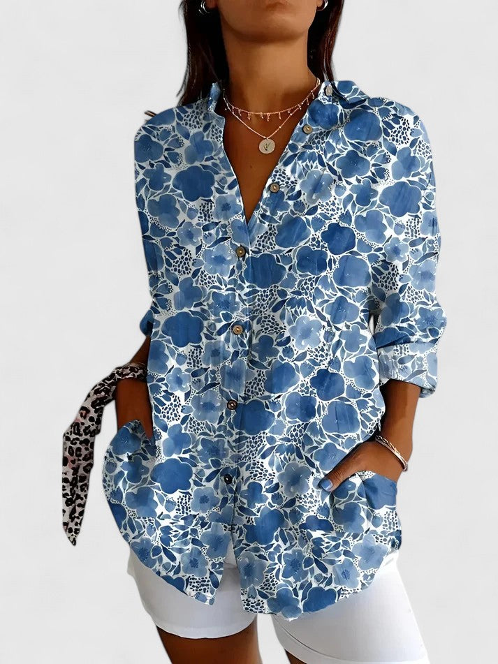 Beautiful floral v-neck short sleeve top for women, a comfortable and chic ladies' blouse perfect for any occasion.