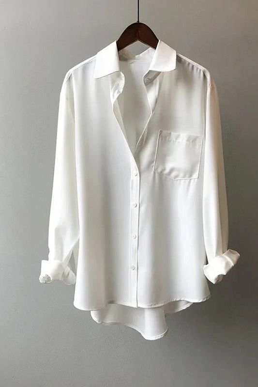 Comfortable women's flowy top, a versatile summer blouse for casual wear or smart spring style.