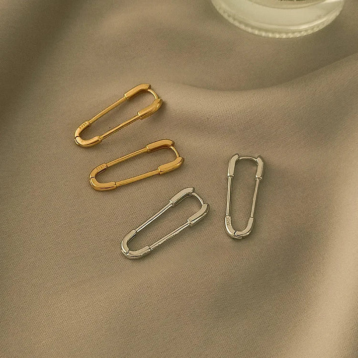 Stylish women's paperclip chain earrings in both gold & silver. Modern fashion jewelry, an elegant gift for her.
